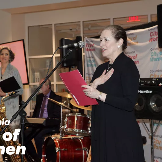 Rachel Barnett presents a Columbia City of Women honoree